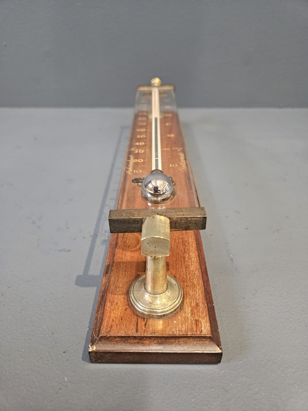 Victorian mahogany and brass wall thermometer with engraved Fahrenheit and Centigrade scales by Negretti and Zambra. View VIII