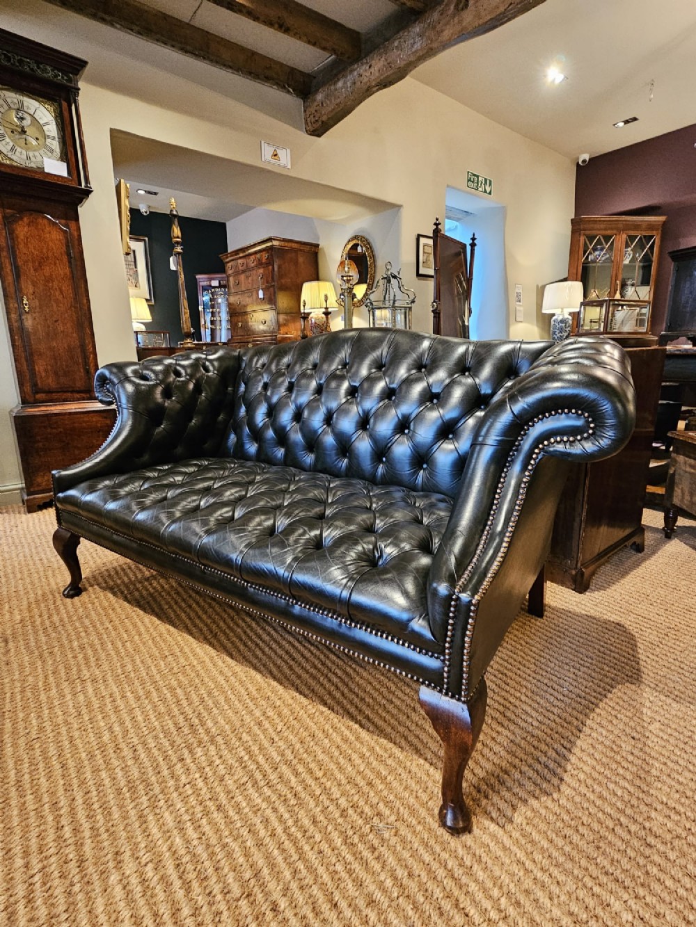 Small Dark Bottle Green Leather Sofa