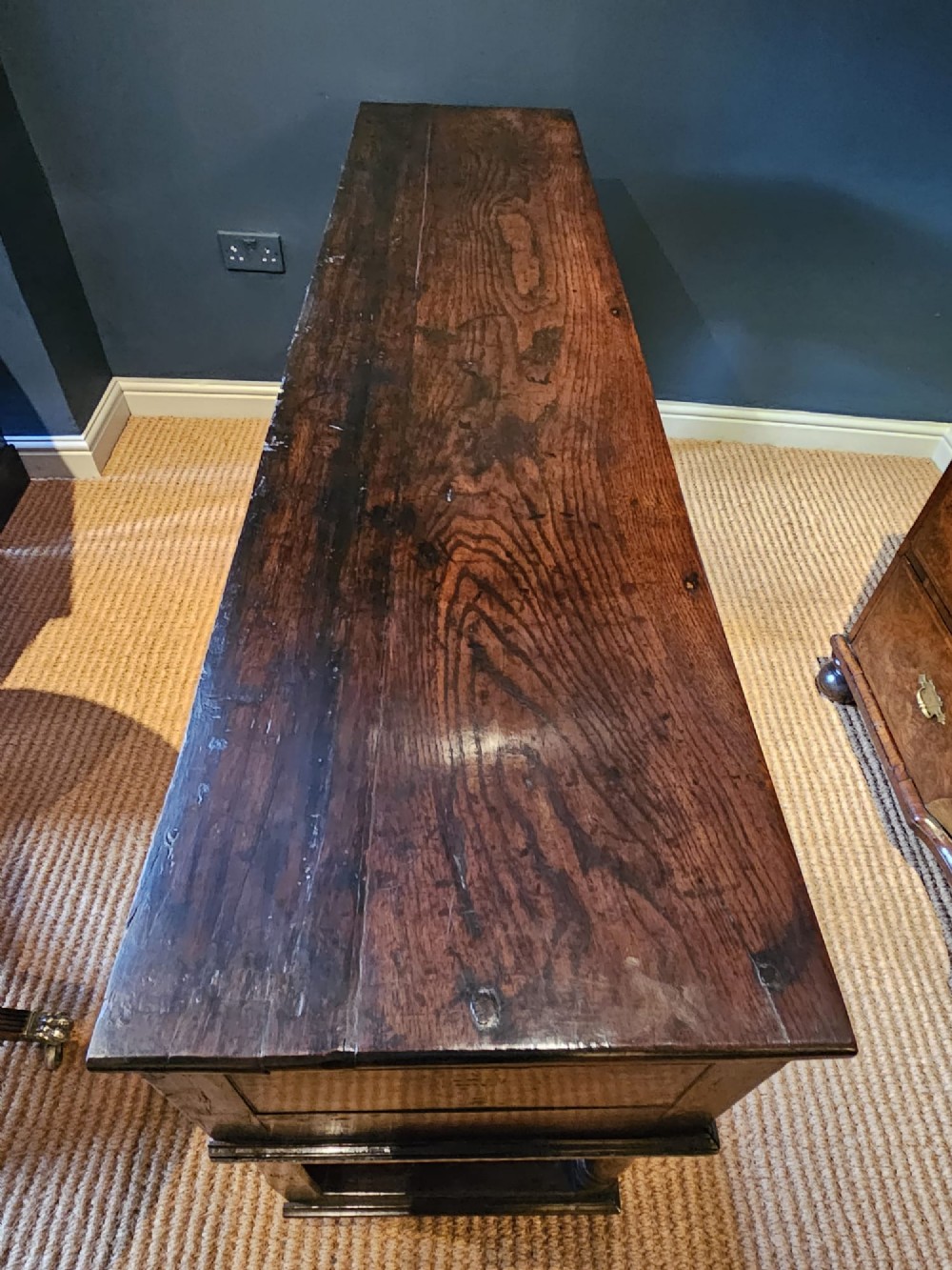 An 18th-century George II oak pot board dresser featuring three frieze drawers with brass handles set above an open lower shelf and turned baluster supports. View III