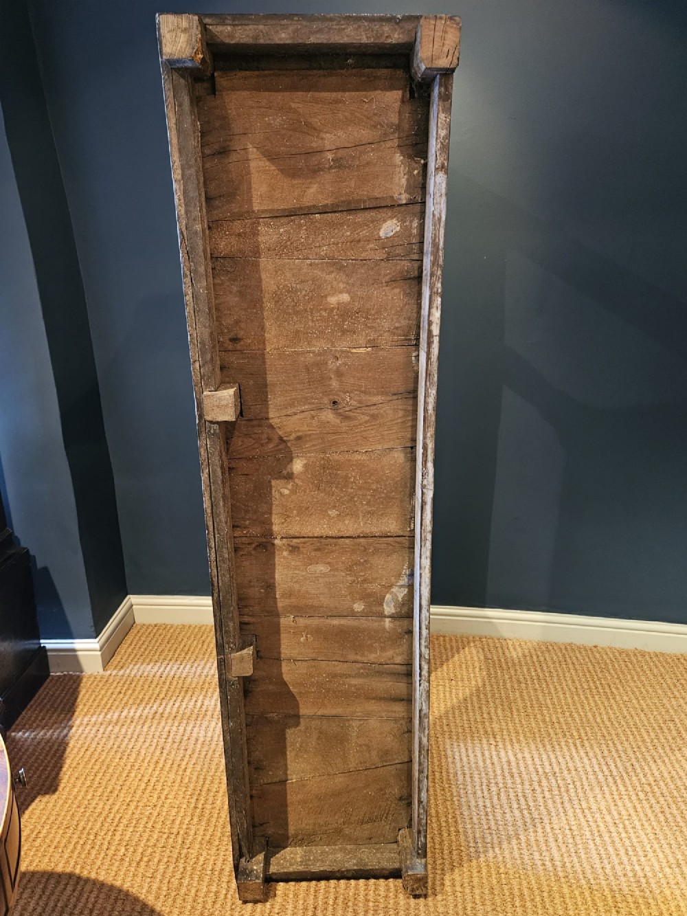 An 18th-century George II oak pot board dresser featuring three frieze drawers with brass handles set above an open lower shelf and turned baluster supports. View IV