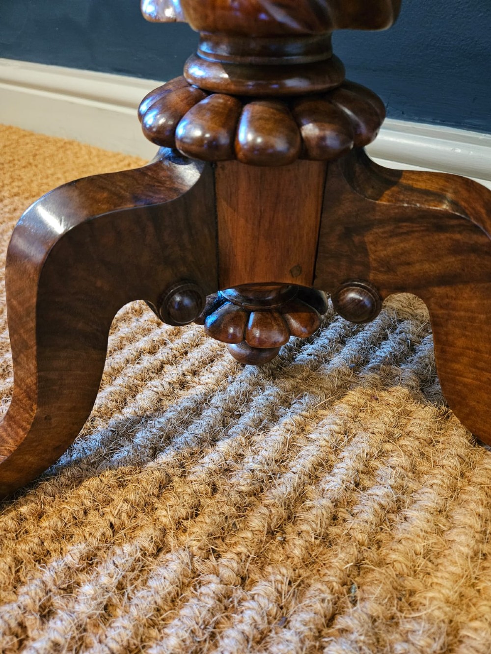 An early Victorian circular burr walnut work table featuring a spiral-turned column, beaded rim moulding, and a tripod cabriole base. View IX