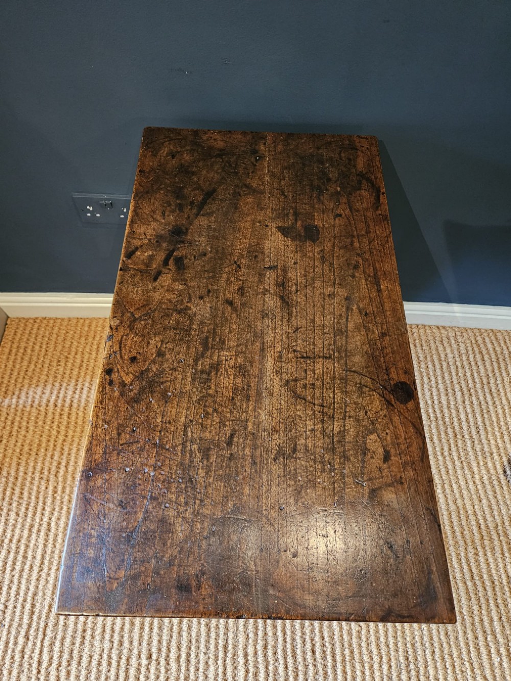 A George III elm single drawer side table featuring a rectangular top, a shaped apron, a turned wooden drawer knob, and tapered square legs. View VIII