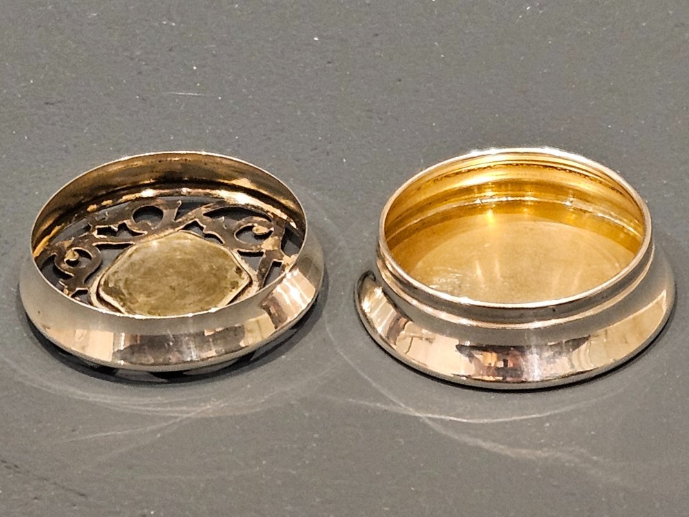 A circular Edwardian silver pot-pourri box featuring a pierced scrollwork lid set with a central mother-of-pearl floral inset. View III