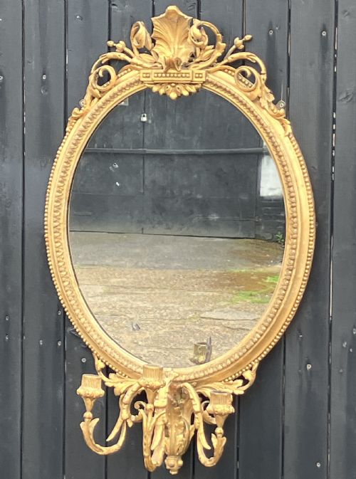 carved giltwood oval girandole wall mirror circa 1880 - CATEGORY: ANTIQUE MIRRORS - DATED 1880