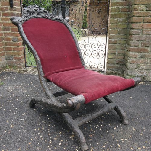 VERY RARE AND UNUSUAL 19TH CENTURY BLACK FOREST CARVED FOLDING CHAIR