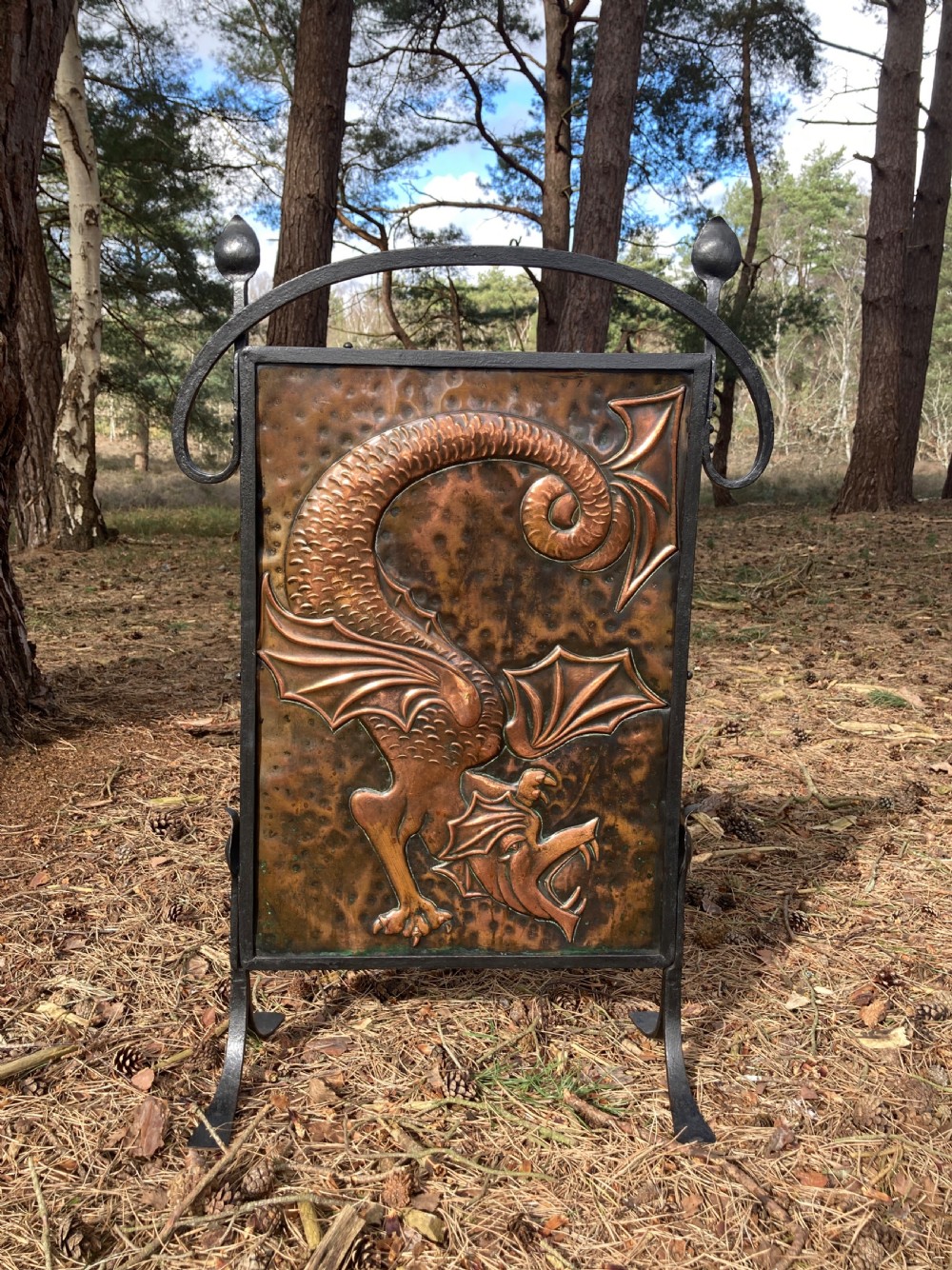 VICTORIAN ARTS AND CRAFTS FIRE-SCREEN IN THE MANNER OF C F A VOYSEY, CIRCA 1890