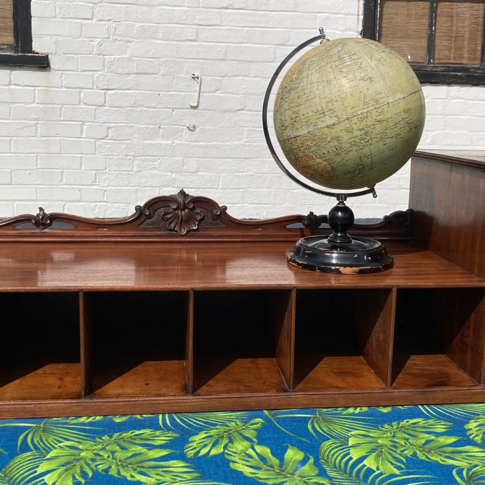 A mid-19th-century Italian mahogany pedestal desk featuring a raised superstructure with pigeonholes, frieze drawers, and twin pedestal cupboards. View IV