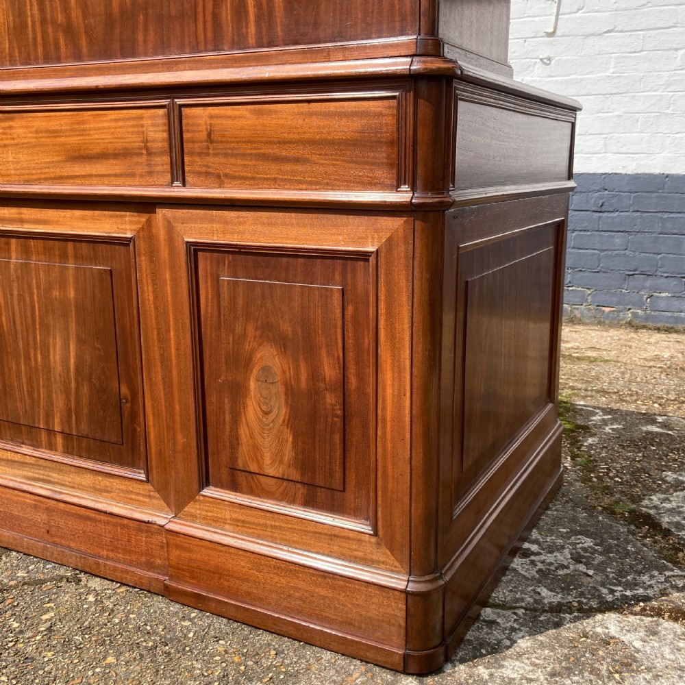 A mid-19th-century Italian mahogany pedestal desk featuring a raised superstructure with pigeonholes, frieze drawers, and twin pedestal cupboards. View XIII