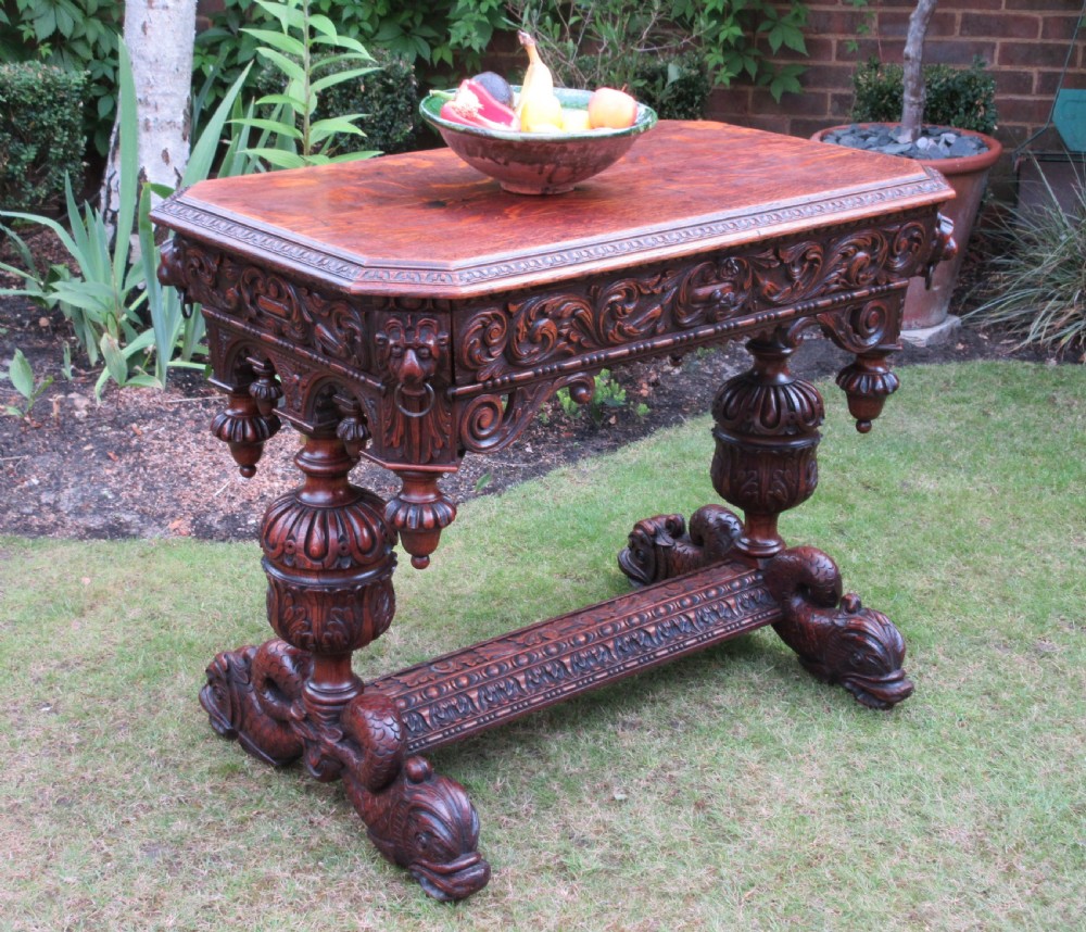 Victorian Carved Tiger Oak Dolphin Centre Table, Circa 1850