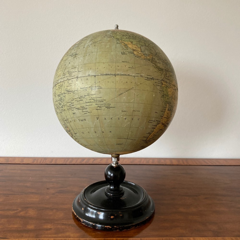 A 1930s Philips British Empire terrestrial desk globe mounted on a chrome semi-meridian and an ebonised wooden base. View VI