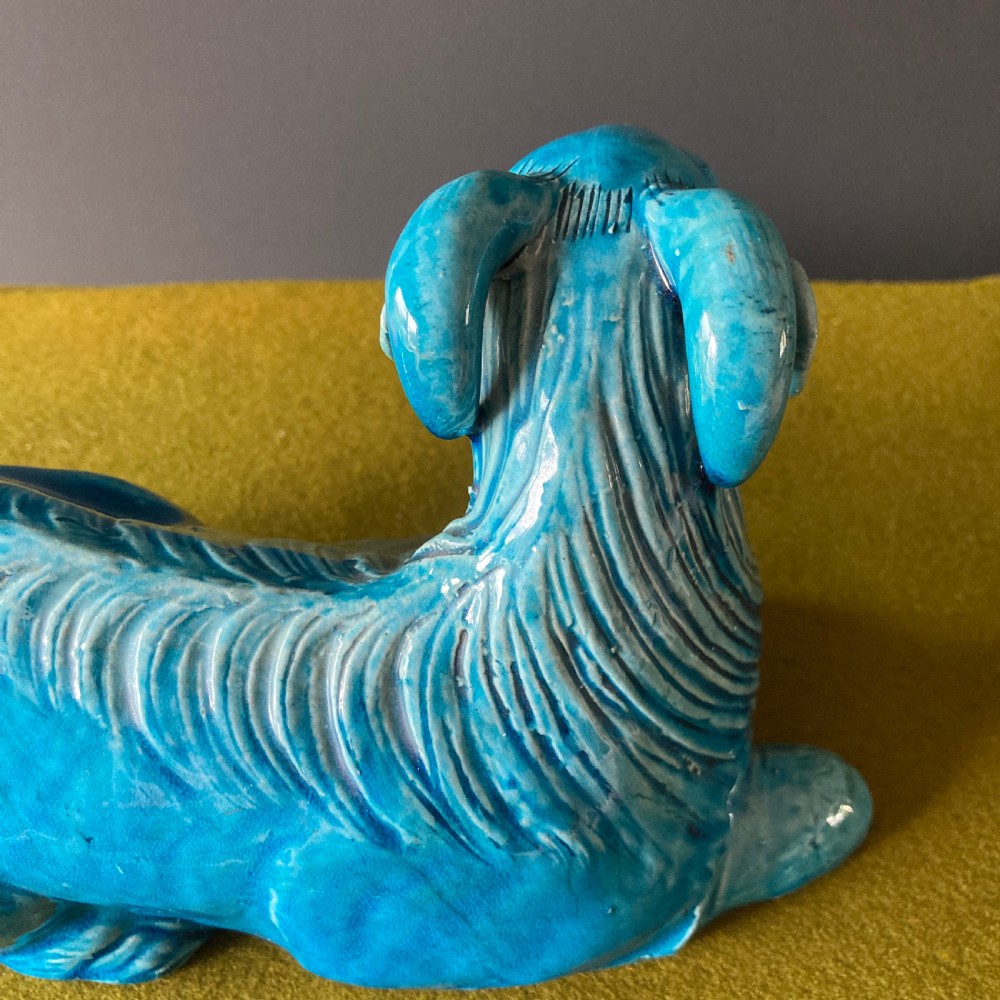 A pair of nineteenth-century Chinese porcelain recumbent goats featuring vibrant turquoise blue monochrome glazing and incised fur detailing. View XIII