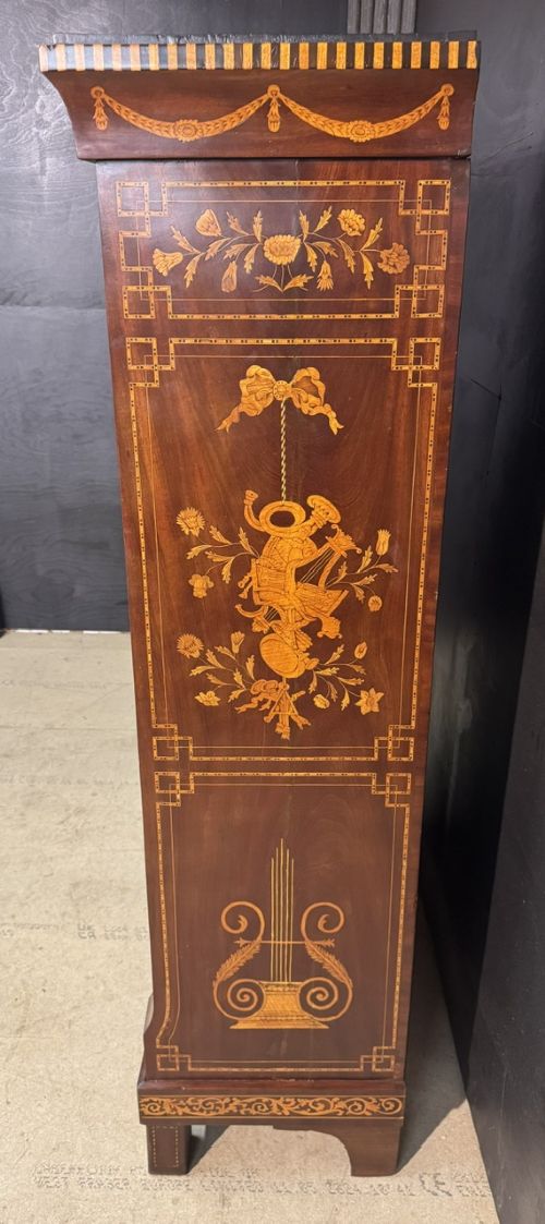 An 18th-century Dutch mahogany tall chest of drawers featuring intricate floral marquetry inlay across six drawers with brass handles. View VII