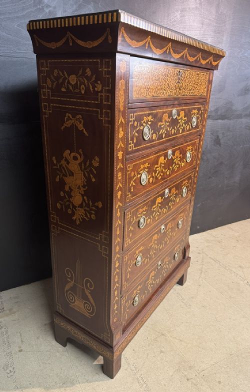 An 18th-century Dutch mahogany tall chest of drawers featuring intricate floral marquetry inlay across six drawers with brass handles. View VIII