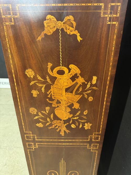 An 18th-century Dutch mahogany tall chest of drawers featuring intricate floral marquetry inlay across six drawers with brass handles. View XV