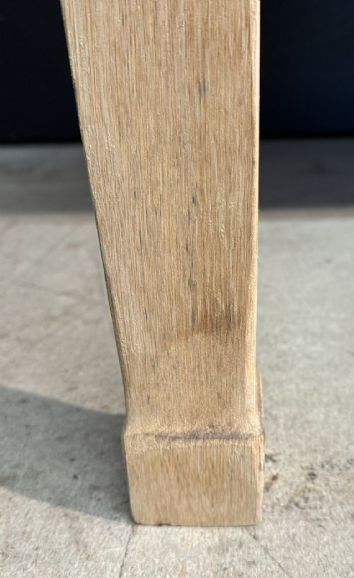 A rectangular light oak dining table featuring clean straight edges, a planked top, and simple tapered legs against a neutral background. View XII
