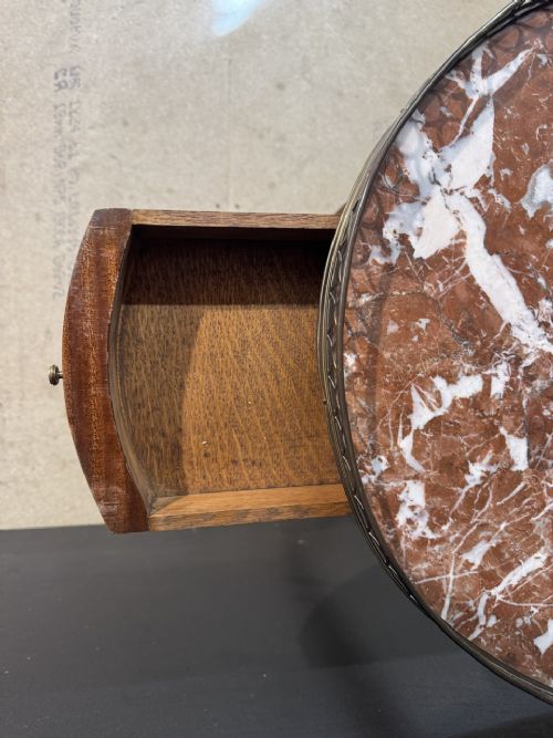 An oval French side table featuring a red veined marble top with a pierced brass gallery, geometric parquetry apron, and four tapered legs adorned with brass mounts. View IX