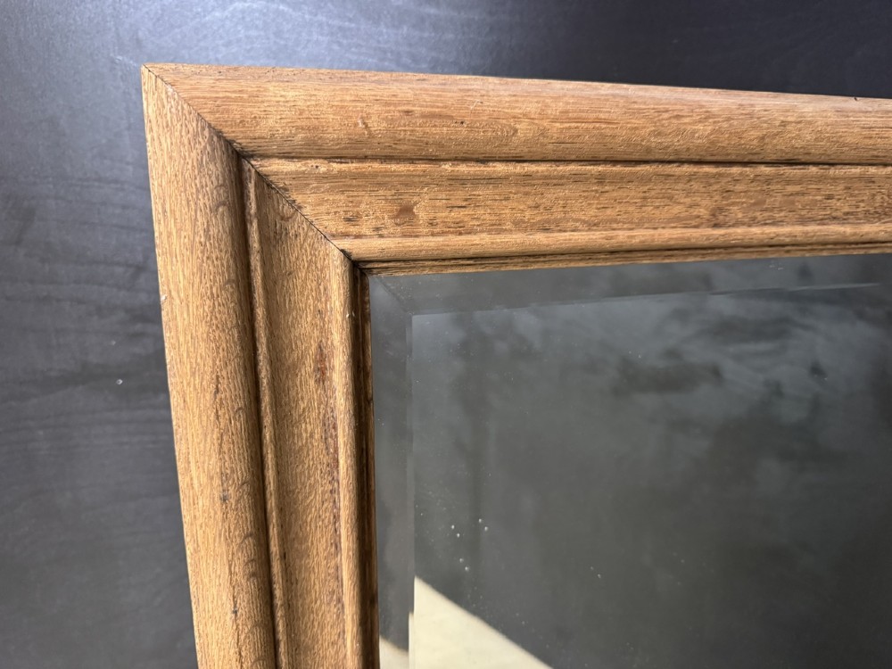 A large rectangular 19th-century French wall mirror with a moulded natural oak frame and a bevelled glass plate. View III