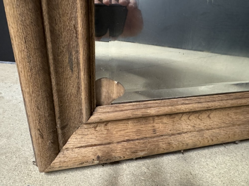 A large rectangular 19th-century French wall mirror with a moulded natural oak frame and a bevelled glass plate. View IV