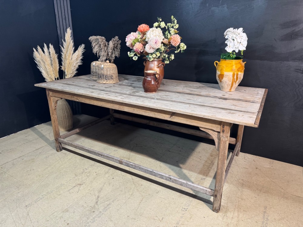 A large rustic wooden French prep table featuring a weathered scrubbed timber top, corner support brackets, and low perimeter stretchers. View II