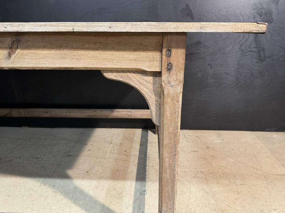 A large rustic wooden French prep table featuring a weathered scrubbed timber top, corner support brackets, and low perimeter stretchers. View VIII