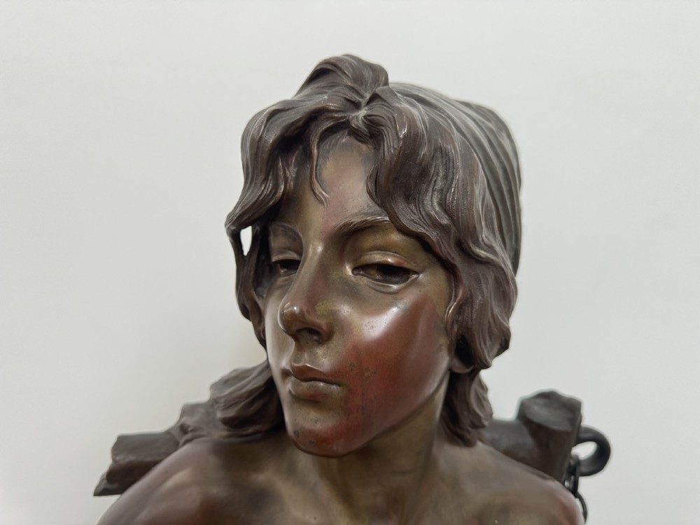 A late 19th-century Art Nouveau patinated bronze bust of a female captive figure by Emmanuel Villanis. View II