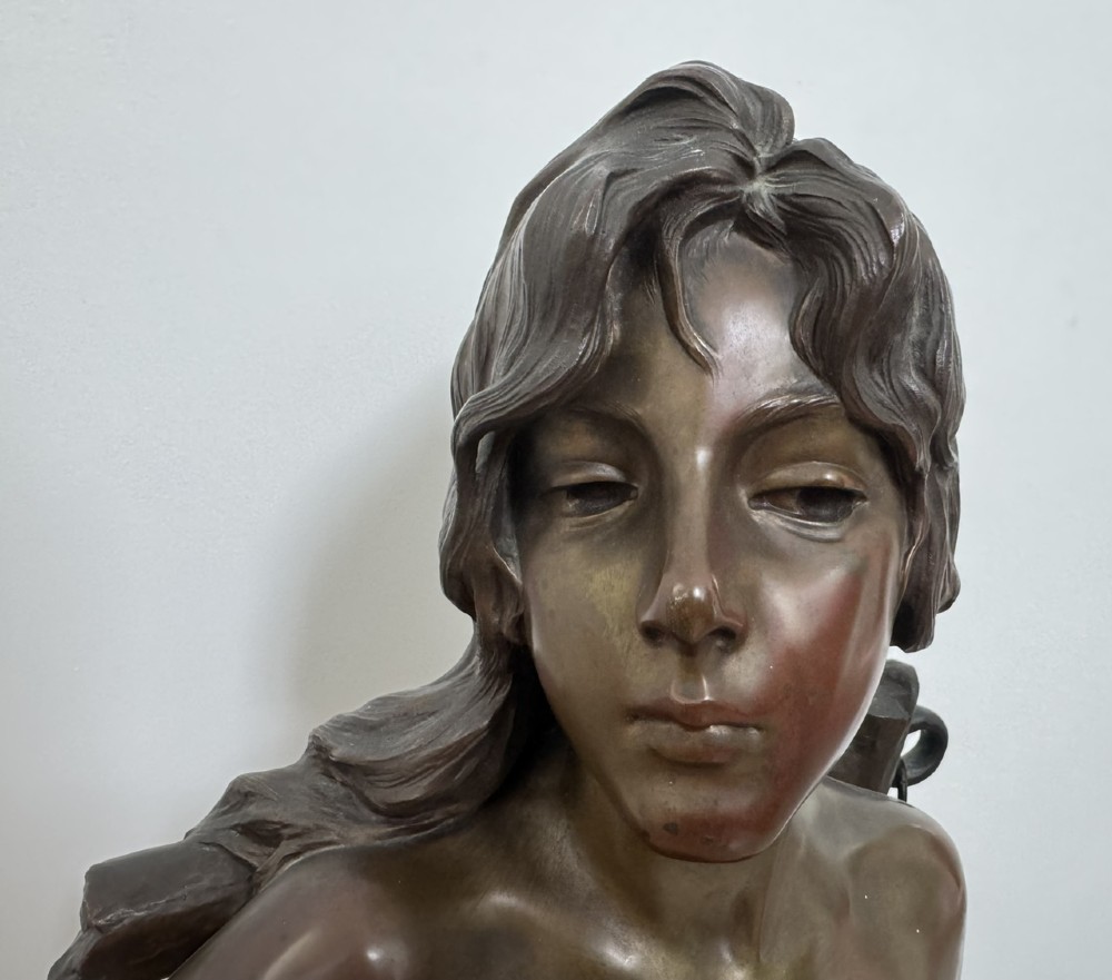A late 19th-century Art Nouveau patinated bronze bust of a female captive figure by Emmanuel Villanis. View V