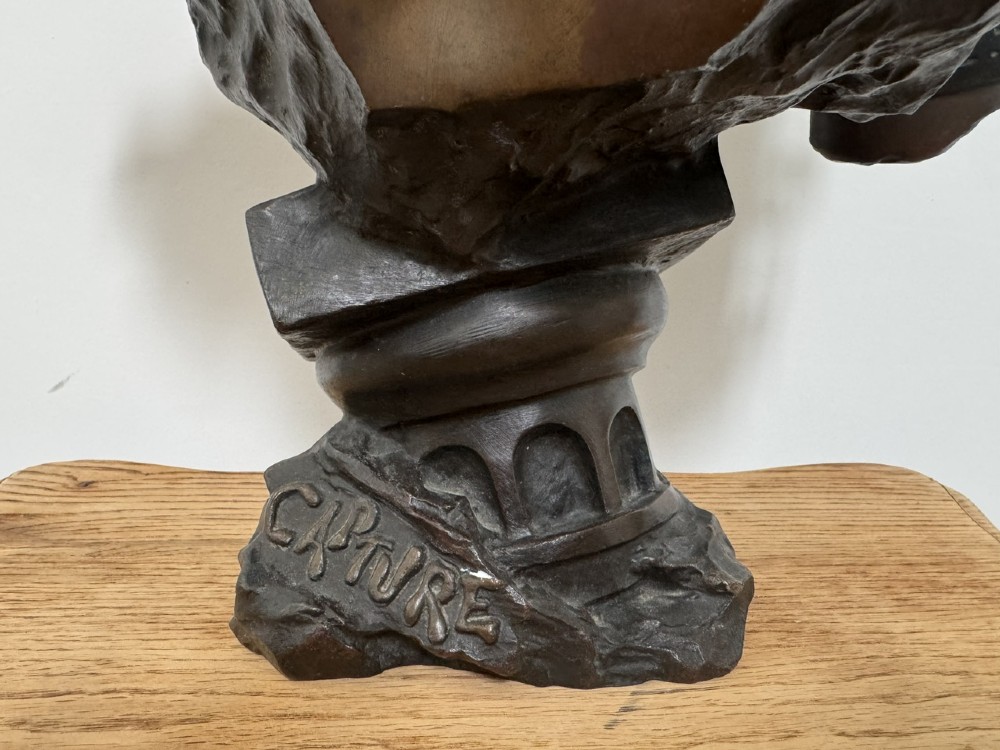 A late 19th-century Art Nouveau patinated bronze bust of a female captive figure by Emmanuel Villanis. View IX