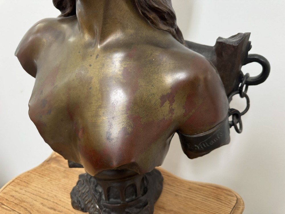 A late 19th-century Art Nouveau patinated bronze bust of a female captive figure by Emmanuel Villanis. View X