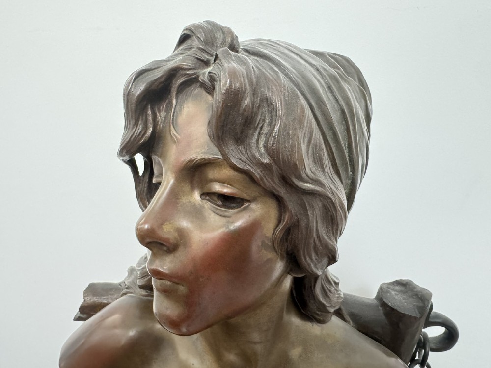 A late 19th-century Art Nouveau patinated bronze bust of a female captive figure by Emmanuel Villanis. View XI