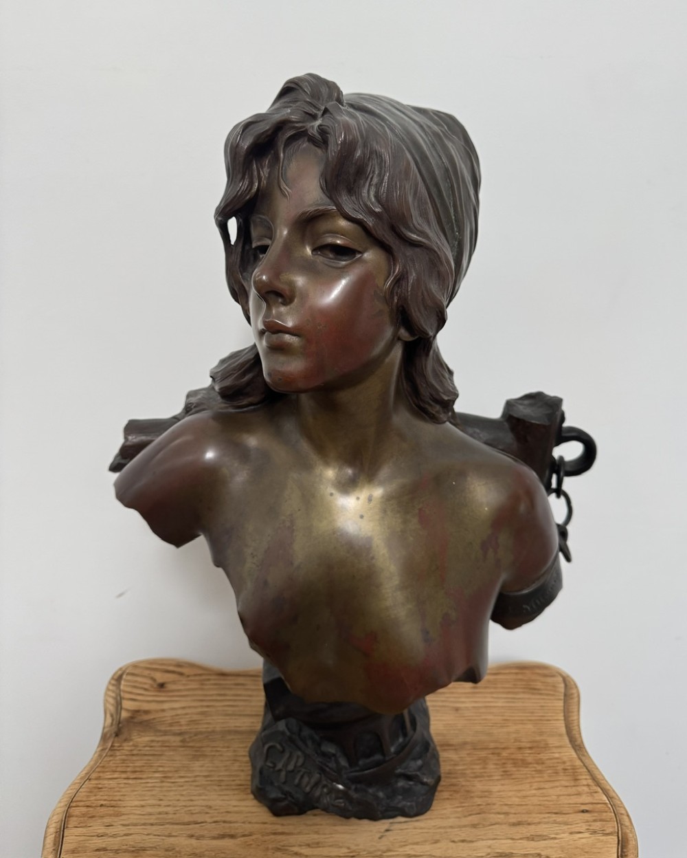 A late 19th-century Art Nouveau patinated bronze bust of a female captive figure by Emmanuel Villanis. View XII