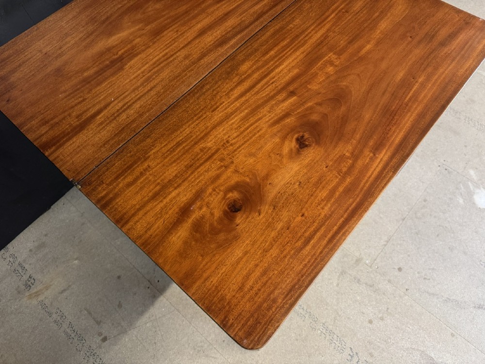 A rectangular Georgian mahogany fold-over tea table featuring fine boxwood string inlay and straight tapered legs. View VII
