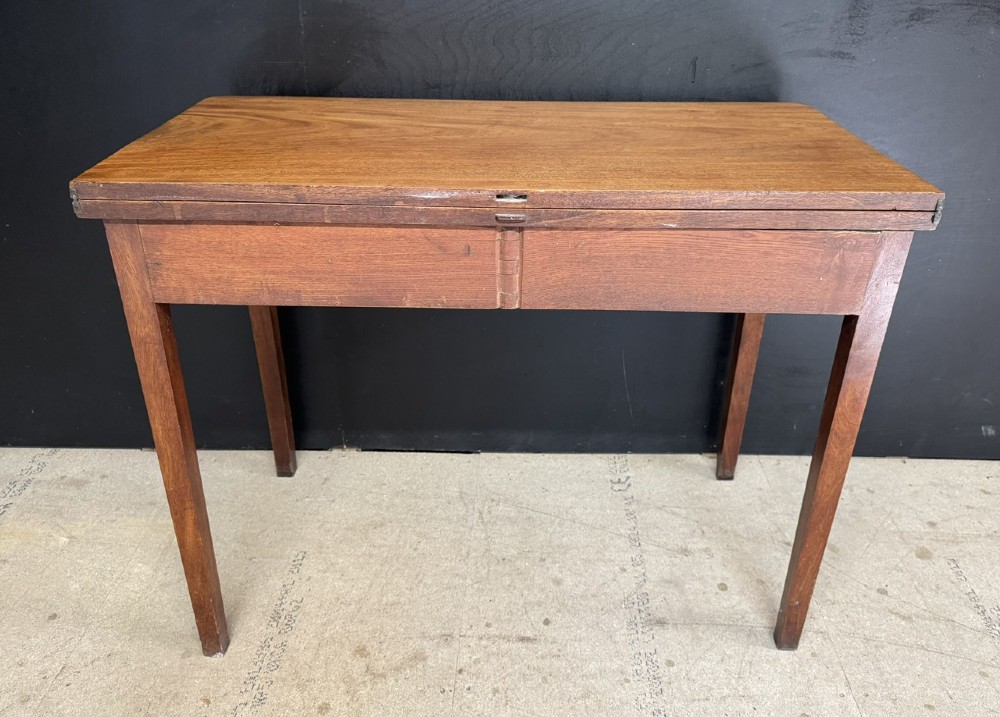 A rectangular Georgian mahogany fold-over tea table featuring fine boxwood string inlay and straight tapered legs. View XI