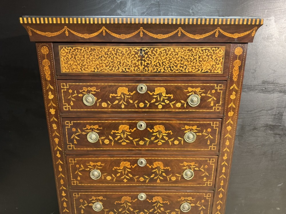 An 18th-century Dutch mahogany tall chest of drawers featuring intricate floral marquetry inlay across six drawers with brass handles. View II