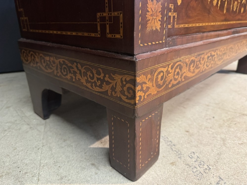 An 18th-century Dutch mahogany tall chest of drawers featuring intricate floral marquetry inlay across six drawers with brass handles. View XII