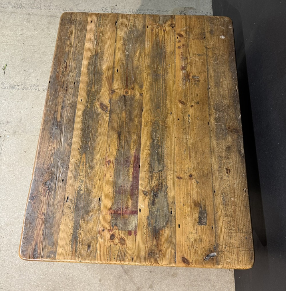 A rectangular rustic pine coffee table featuring a plank top, two front drawers with decorative ceramic knobs, and four turned wooden legs. View III