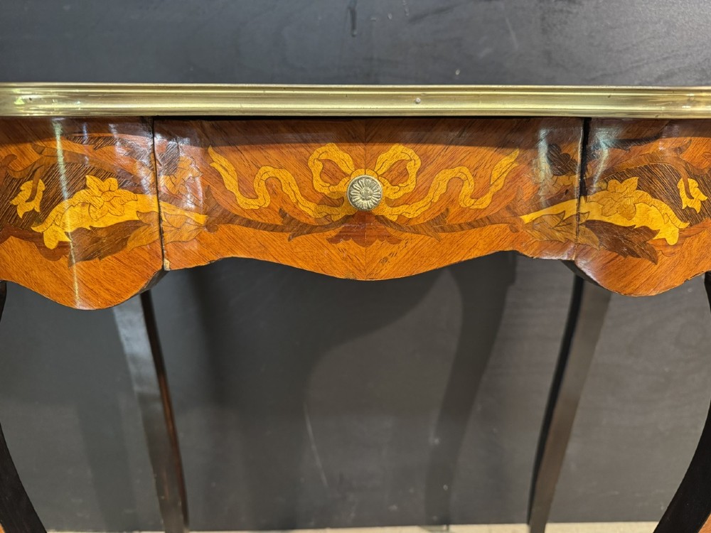 A French Louis XV style marquetry side table featuring cabriole legs, decorative brass mounts, and detailed floral wood inlay across the serpentine top and drawer. View XII