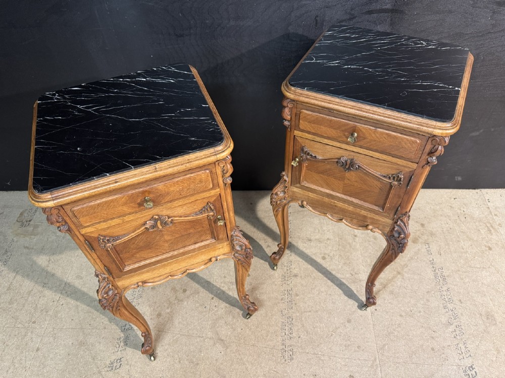 A pair of French walnut bedside cabinets with carved cabriole legs, dark marble tops, single drawers, and cupboard doors. View III