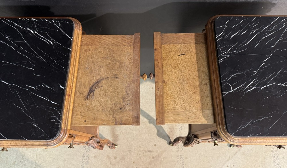 A pair of French walnut bedside cabinets with carved cabriole legs, dark marble tops, single drawers, and cupboard doors. View XIII