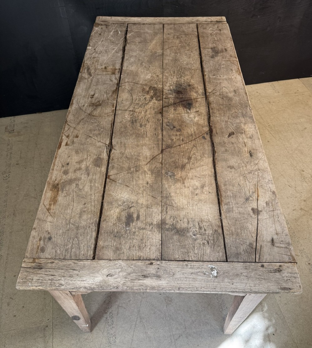 A rustic French provincial kitchen table featuring a scrubbed timber plank top, a single frieze drawer with a small knob, and four tapered square legs. View XII