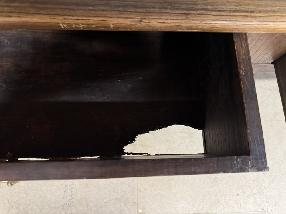 A rectangular antique French chestnut console prep table featuring two drawers with brass drop handles and square tapered legs. View VIII
