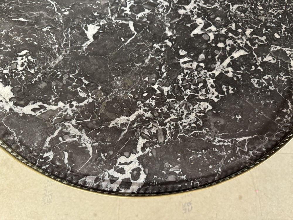 A circular French Louis XVI style lamp table featuring a dark veined marble top, a pierced brass gallery rim, a single drawer, and four square tapered legs. View III