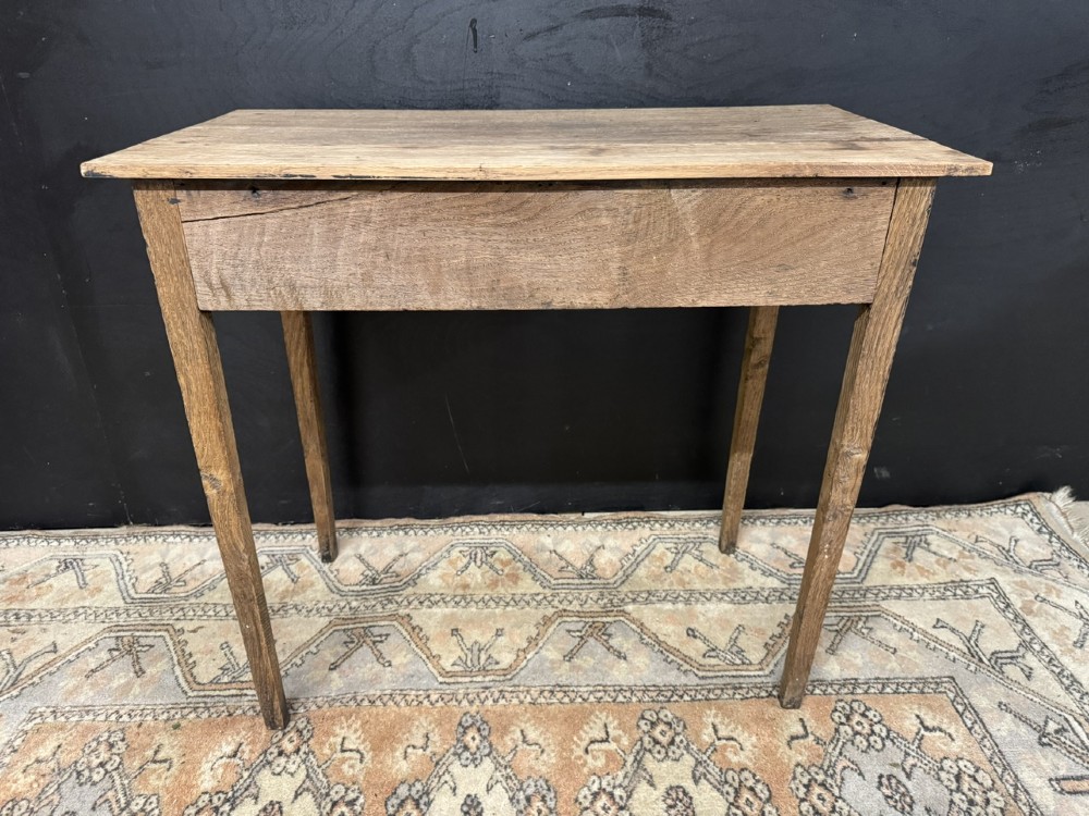 A Georgian oak side table featuring a single frieze drawer with a brass swan-neck handle and four square legs. View VIII