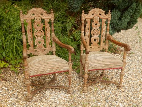 A Pair of Limed Oak Arm Chairs