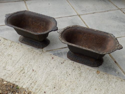 A Pair of Cast Iron Garden Urns