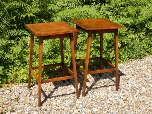 A Pair of Solid Oak Arts and Crafts Side Tables.
