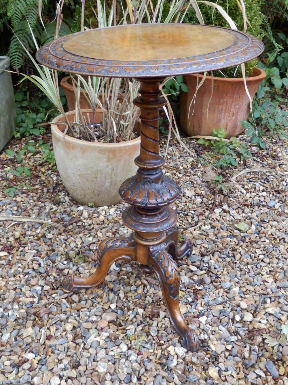 Victorian circular pedestal tripod table.