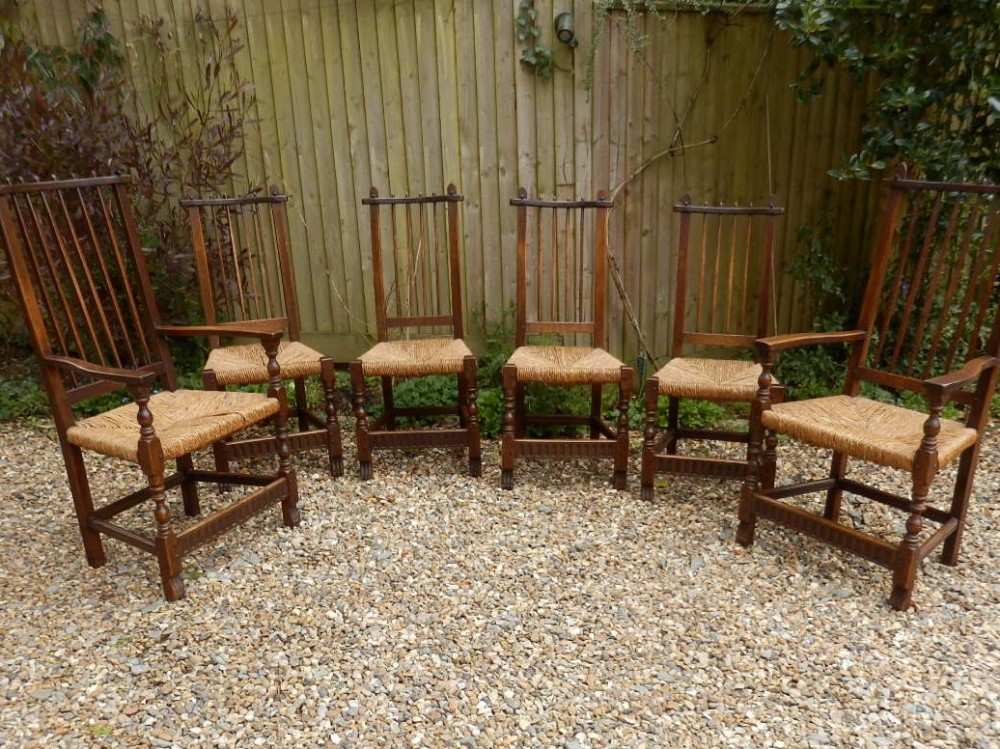 Dining chairs, set of 6 Arts and Crafts. Solid oak with rush seats.