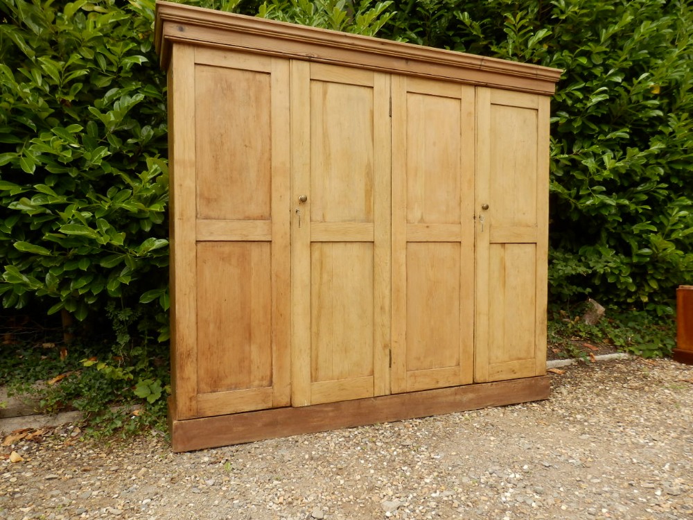 Pine school cupboard by F. Coote. Arts and Crafts.