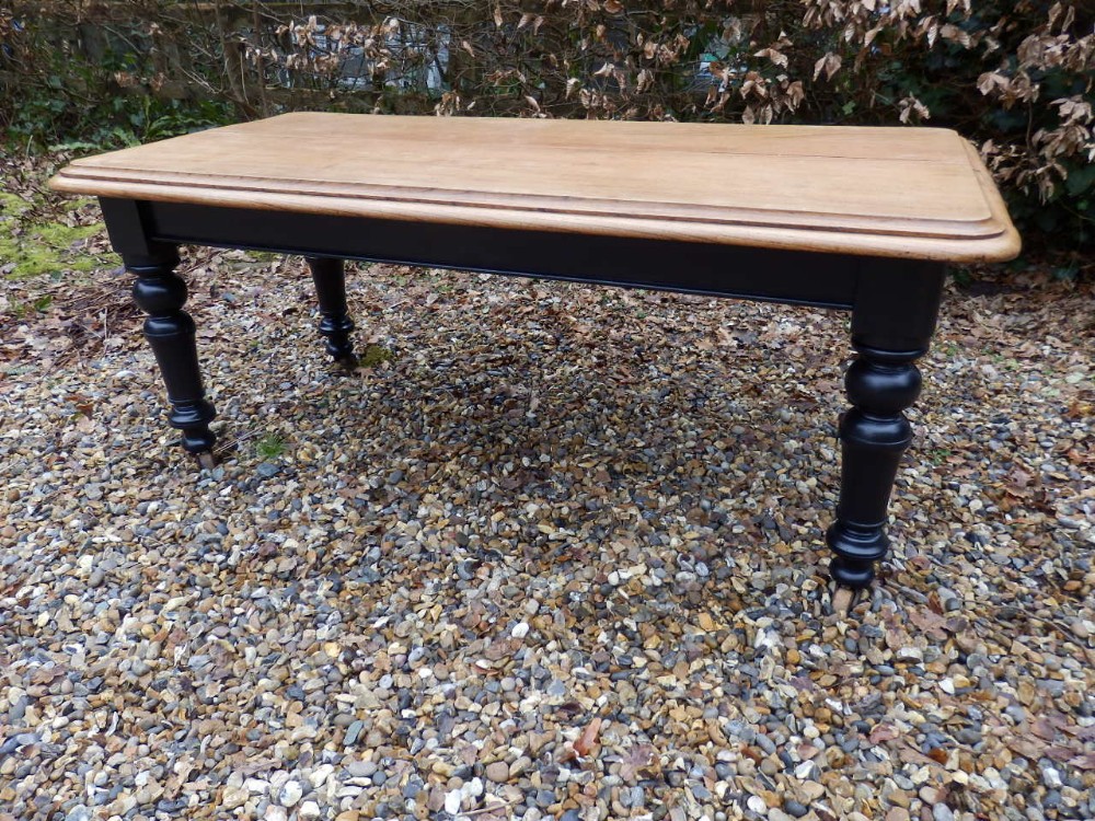Victorian Dining table with a solid Elm top.