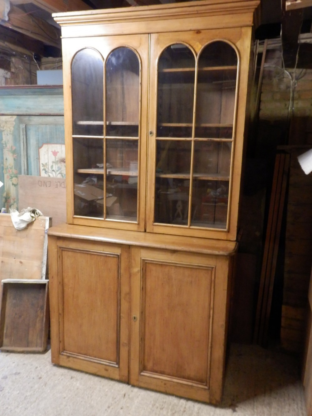 Bookcase over a cupboard. Victorian. 